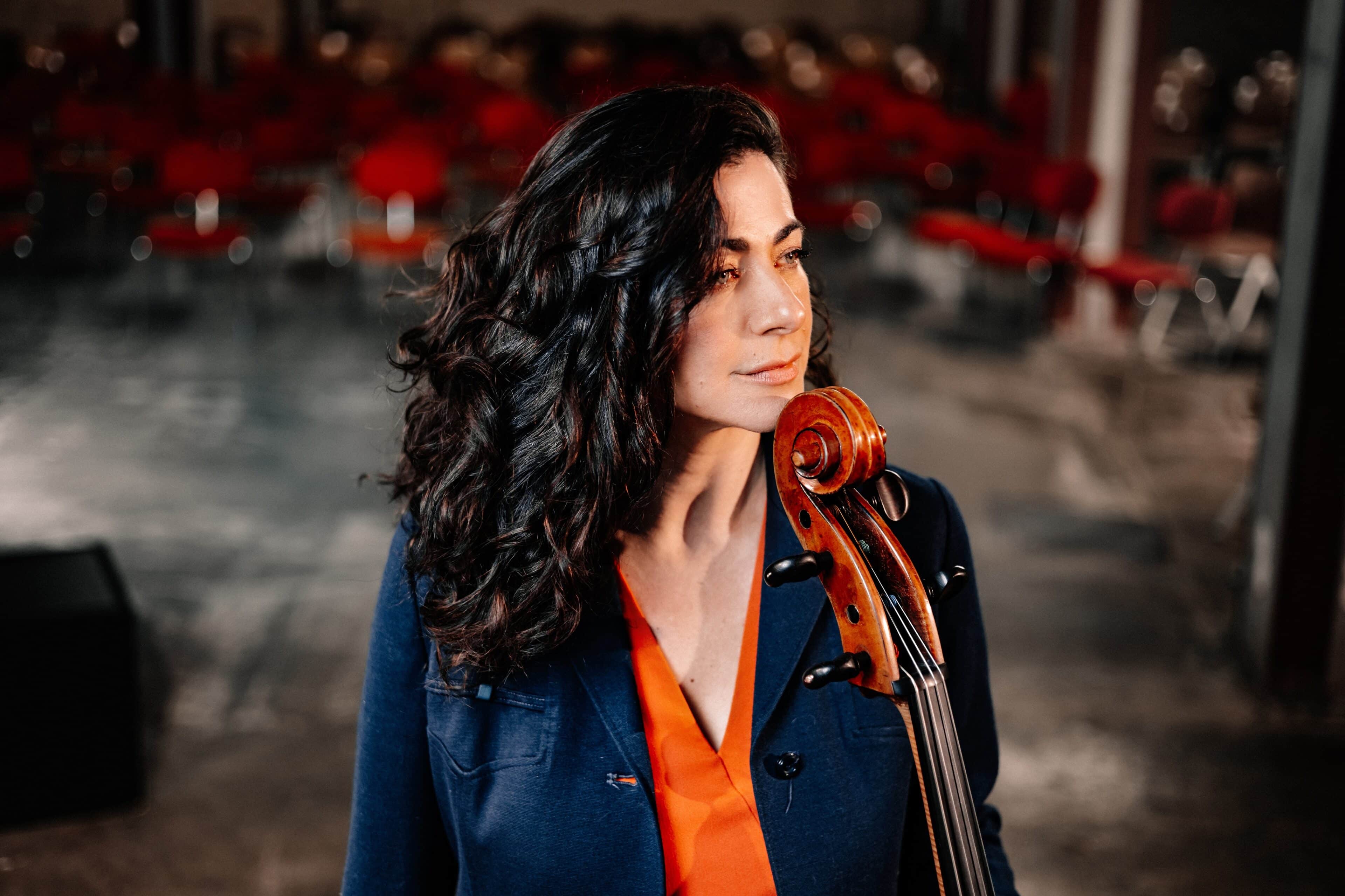 Photo of Natalie holding Cello